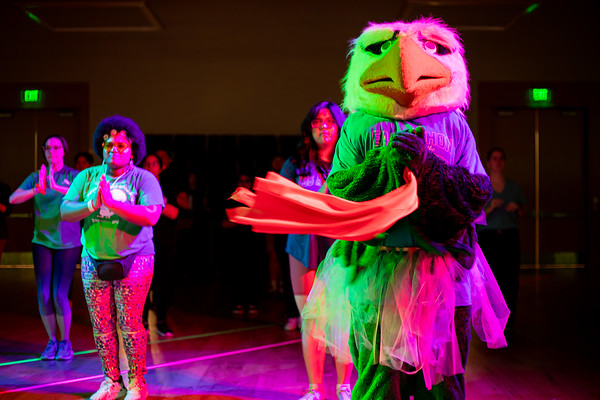 students dancing with scrappy the eagle