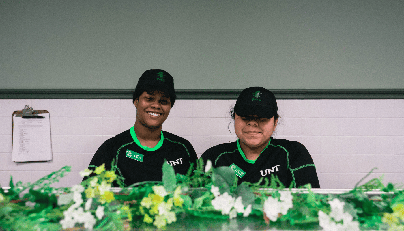 smiling UNT Dining Services employee