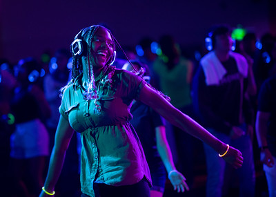 students at a silent disco dancing