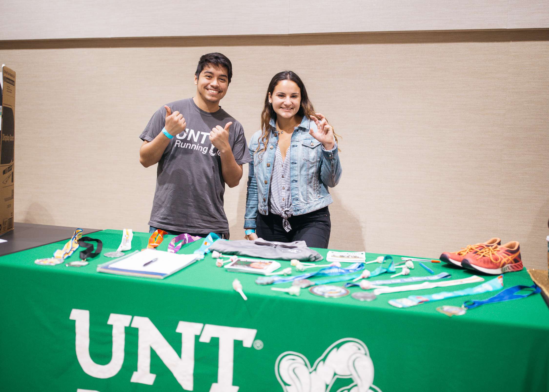 Two students at an org booth 