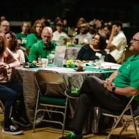 Legacy families and UNT staff at table