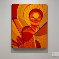 Red and orange abstract painting with a figure in the center