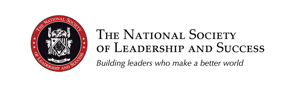 Students and staff with a National Society of Leadership logo