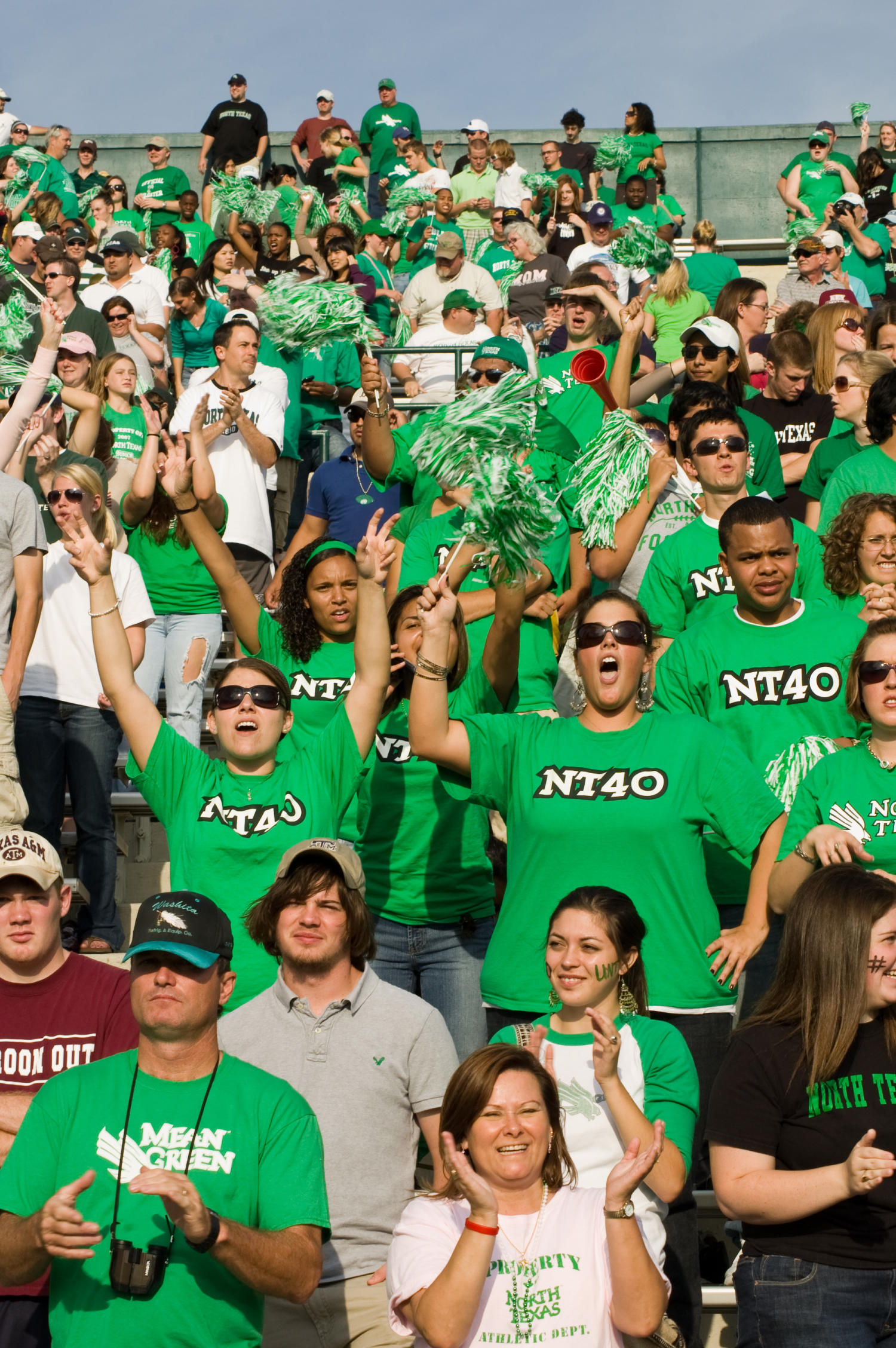 nt40 members at a football game in crowd