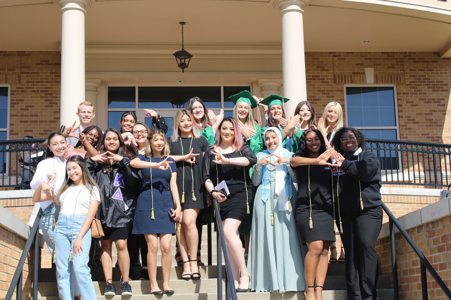 Group of UNT Students Planting Plants In Soil