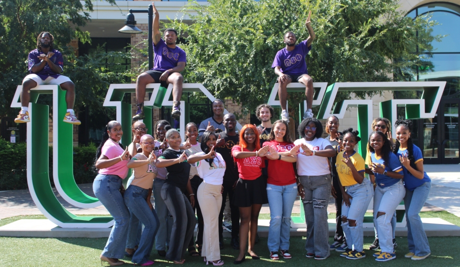 Members of National Panhellenic Council at the UNT letters.