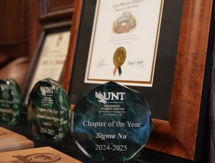 An image of the Chapter of the Year award with Sigma Nu 2024-2025 written on it.