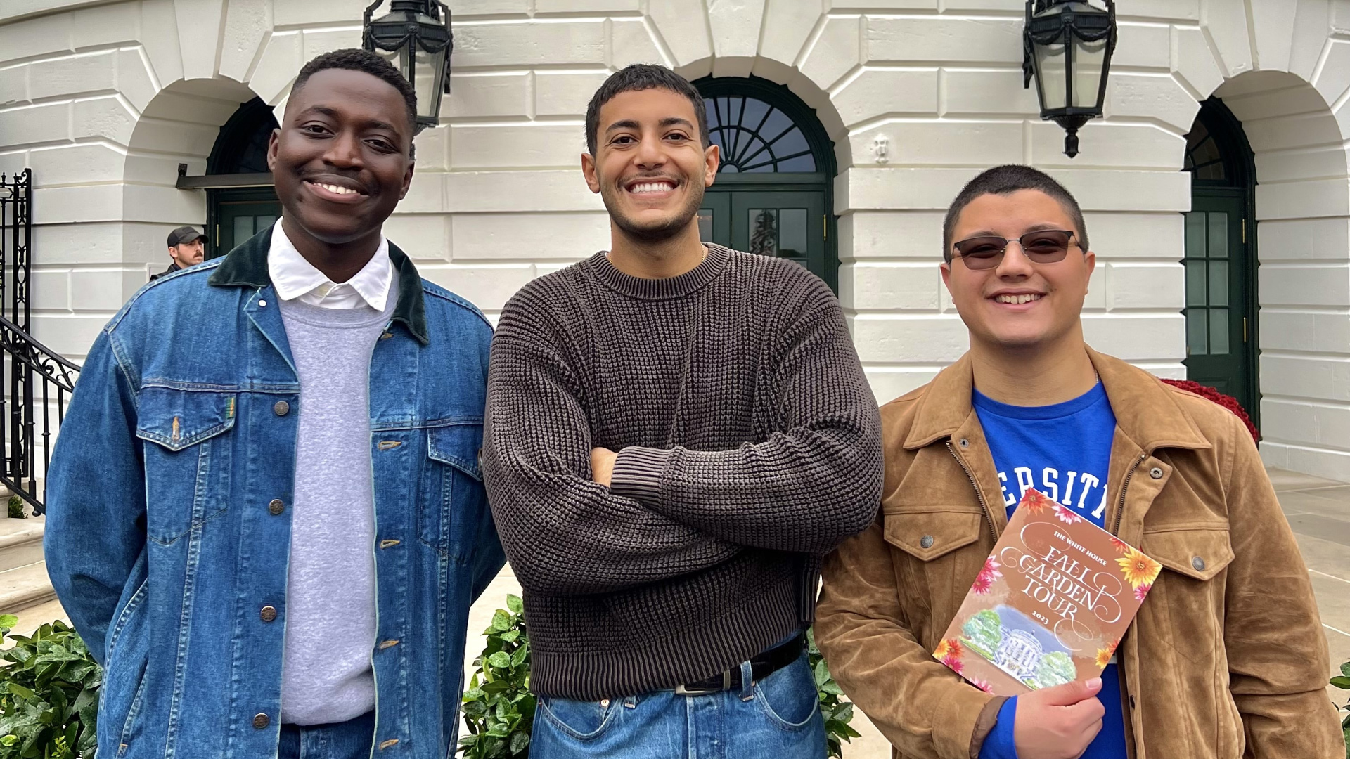 Three Students Posing for a Group Photo at the Fall Garden Tour in Washington D.C.