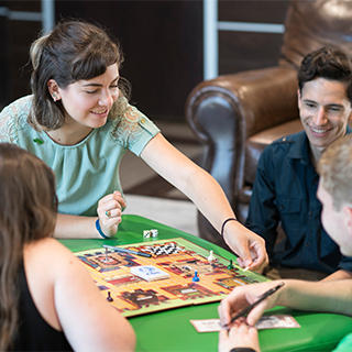 Students playing a board game.