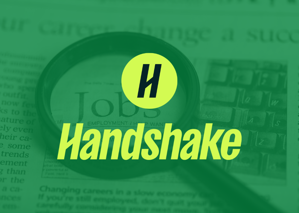 Photo of Newspaper with a magnifying glass on the work "Jobs" and an image of the Handshake logo
