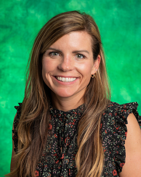 brown hair, green eyes, green background