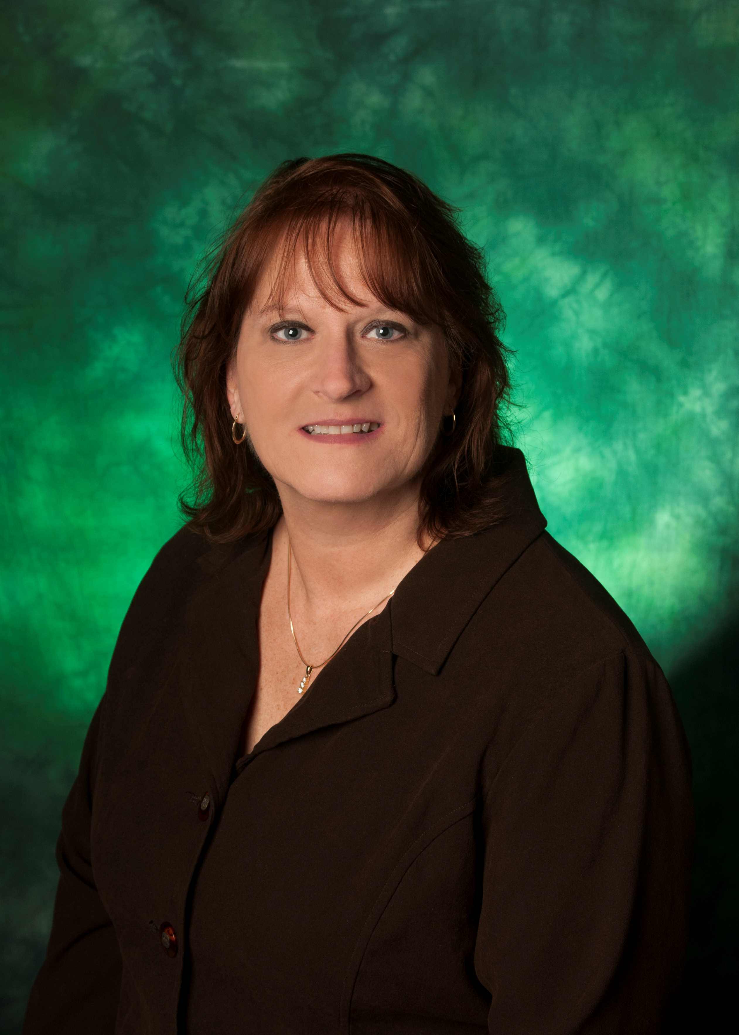 brown hair, green eyes, green background