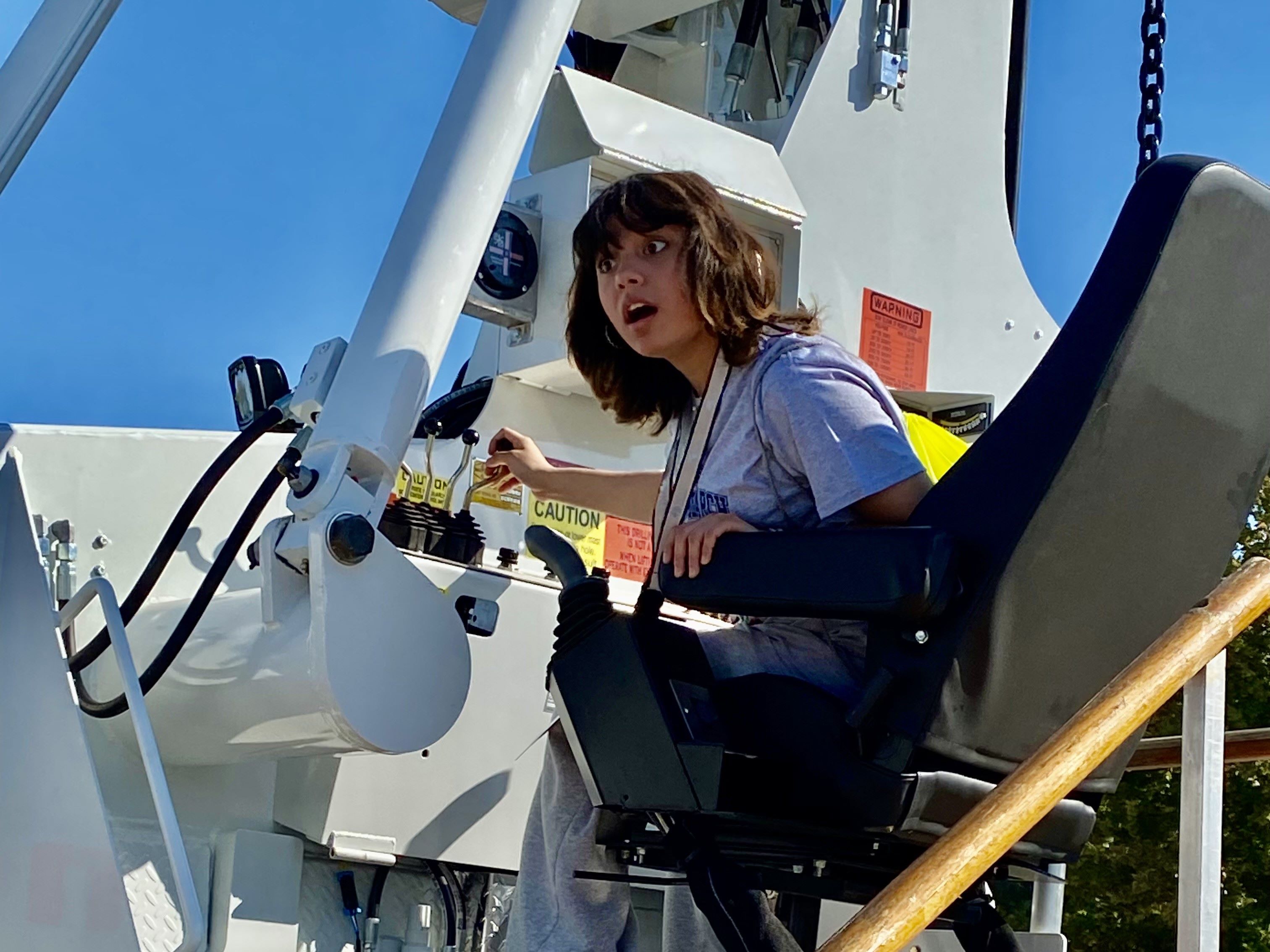 girl on construction equipment